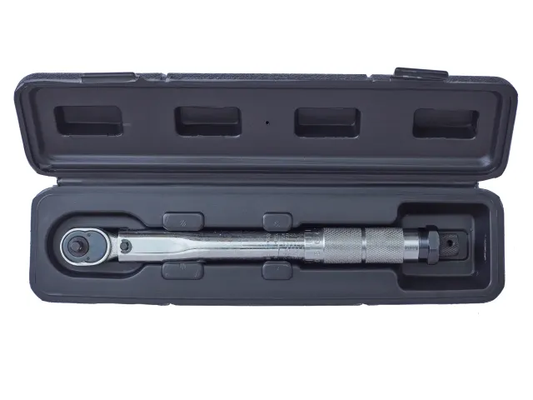 Torque wrench in an open black case on a white background