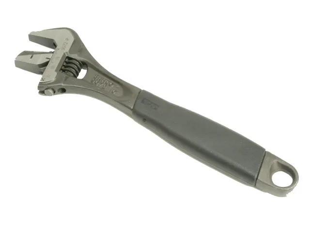 Adjustable wrench on a white background