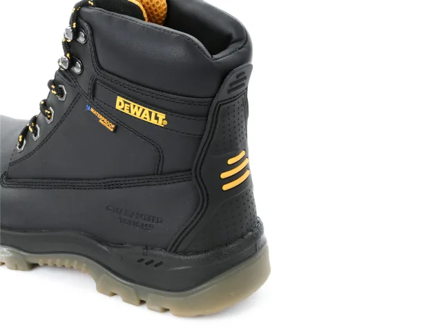 Black work boot with yellow accents on a white background