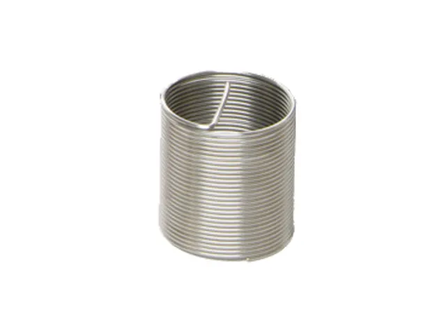Metallic coiled spring on a white background