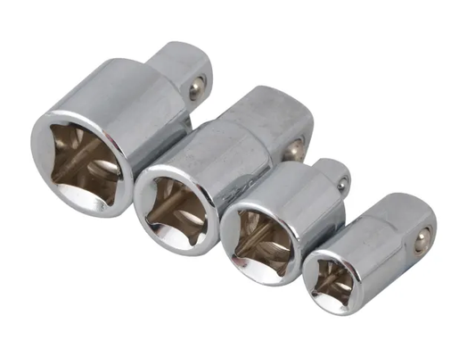 Set of four metallic drill bits on a white background