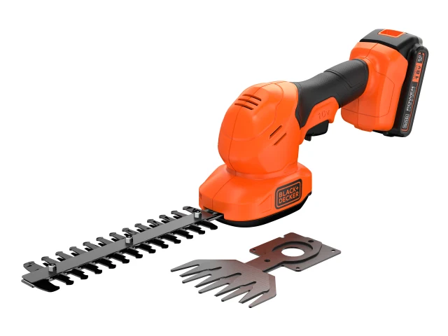 Orange and black hedge trimmer with attachments on a white background