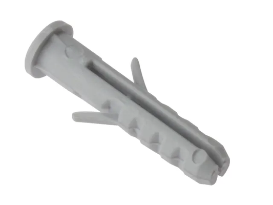 Gray plastic wall anchor on a white background