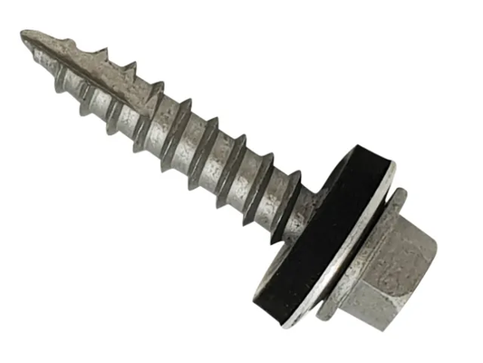 Metal screw with washer on a white background