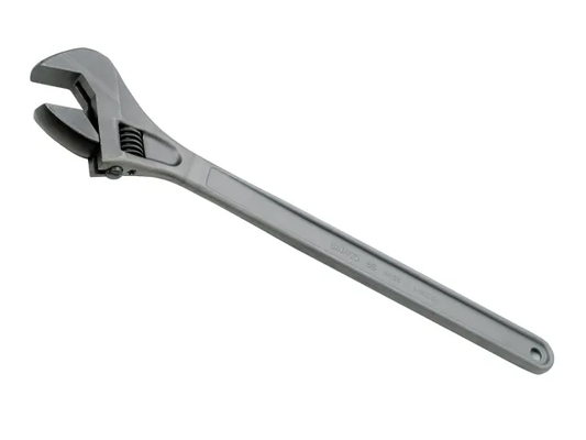 Adjustable wrench on a white background