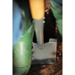 Close-up of a green garden tool with a blurred background