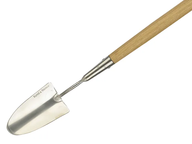 Small gardening spade with a wooden handle on a white background