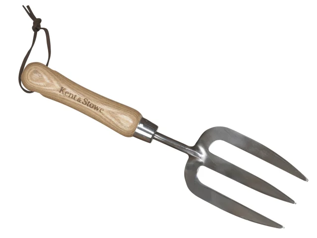 Gardening fork with wooden handle and metal prongs on a white background