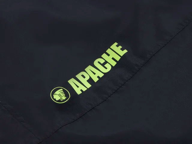 Black jacket with 'Apache' logo in green on a dark background