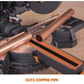 Copper pipe being cut by a miter saw on a wooden surface
