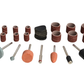 Assorted sanding drums and grinding stones on a white background