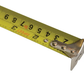Yellow measuring tape with metal clip on a white background
