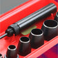 Black metal tool with various attachments on a red background