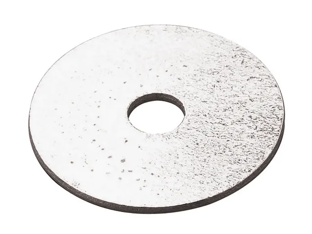 Round metallic washer with a central hole on a white background