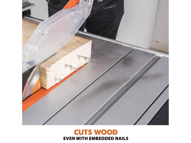 Table saw cutting wood with embedded nails on a white background
