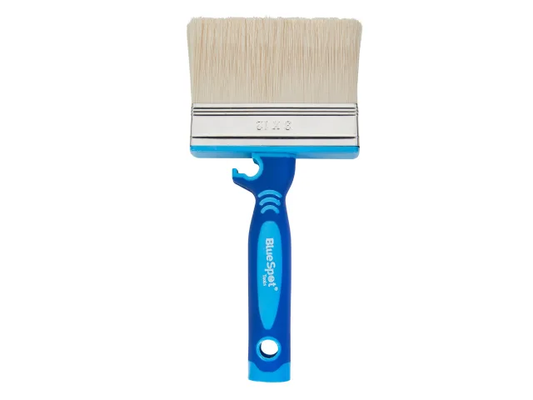 Paint brush with blue handle and white bristles on a white background