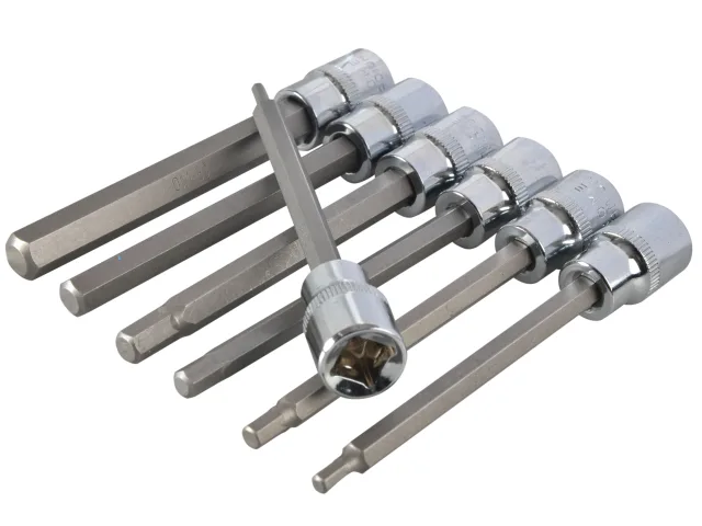 Set of metal drill bits on a white background