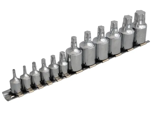 Set of drill bits in a metal holder on a white background