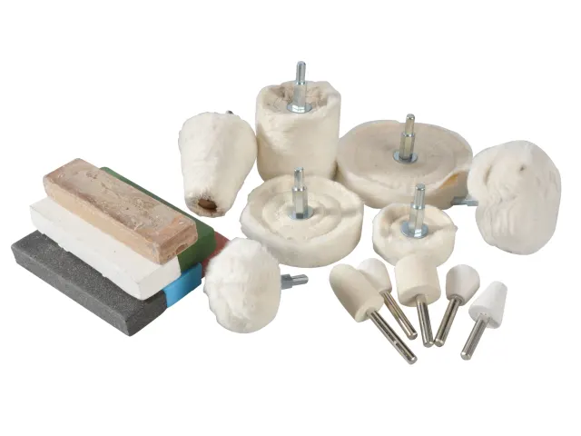 Set of various polishing pads and tools on a white background