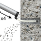 Concrete mixing tool with gravel on a textured concrete surface