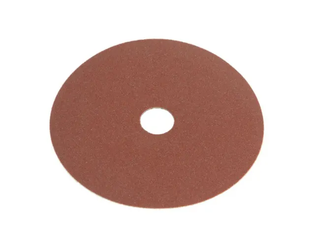 Round sanding disc with a central hole on a white background