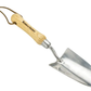 Gardening trowel with wooden handle on a white background