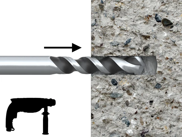 Drill bit with a drill silhouette on a concrete surface